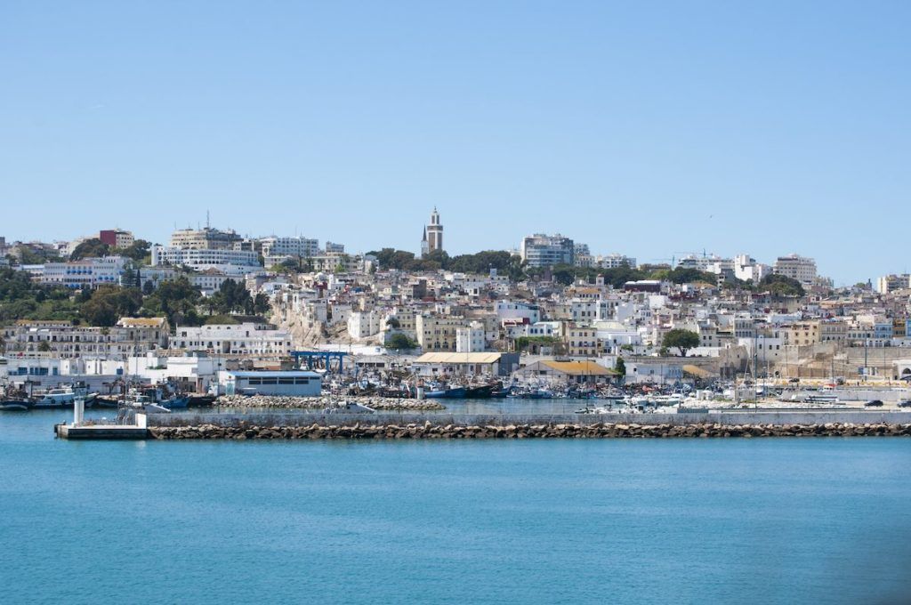 White buildings and sea during daytime