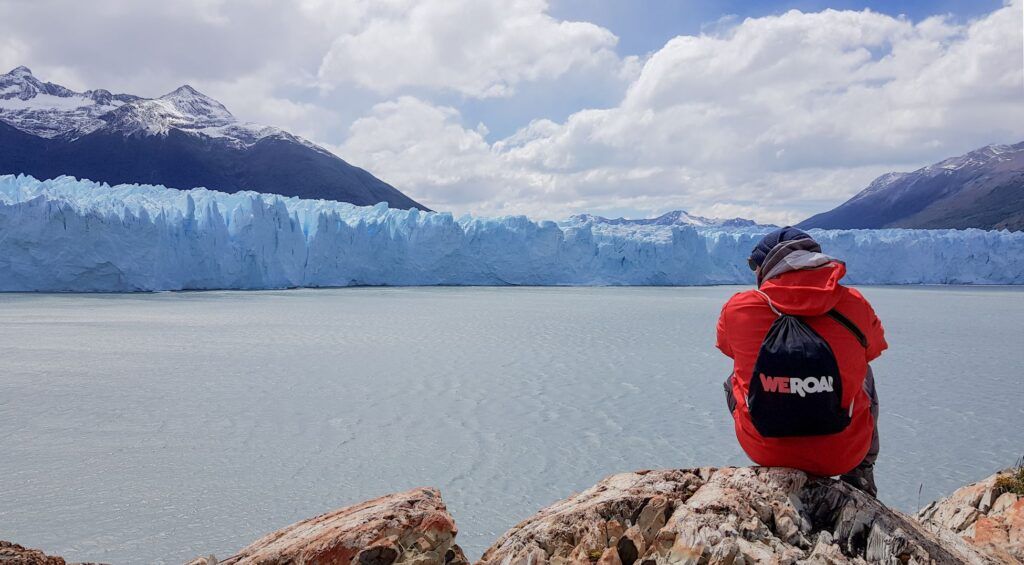 One person ooserves glaciers in Patagonia