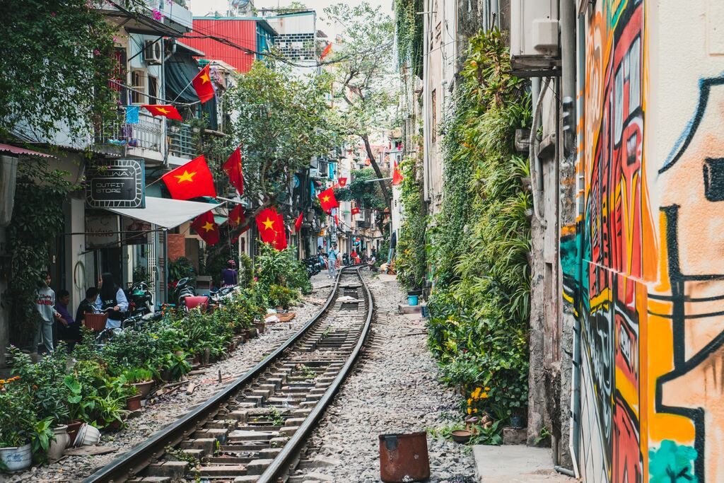 A train track through an alleyway in Hanoi.