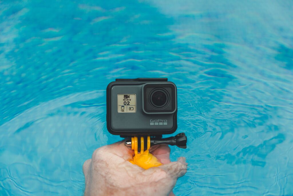 photo of a black camera framing the water