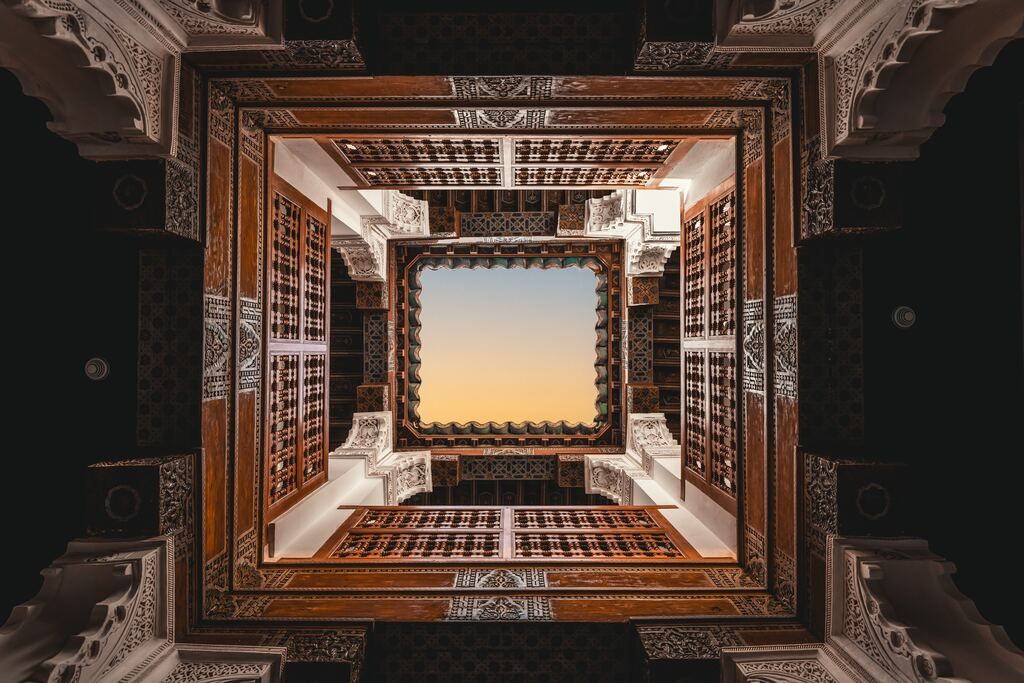 View of the sky from inside a building.