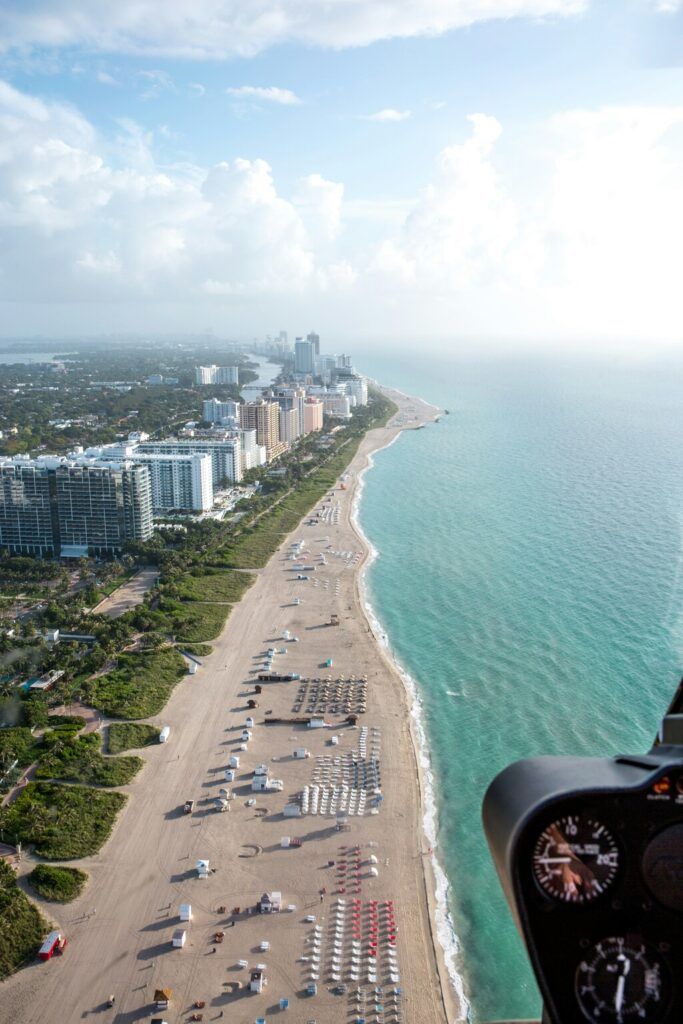 Aerial photograph of the beach and buildings in Miami.