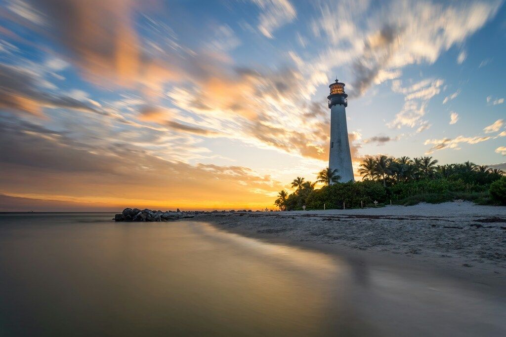 Sunset behind a lighthouse in Miami.