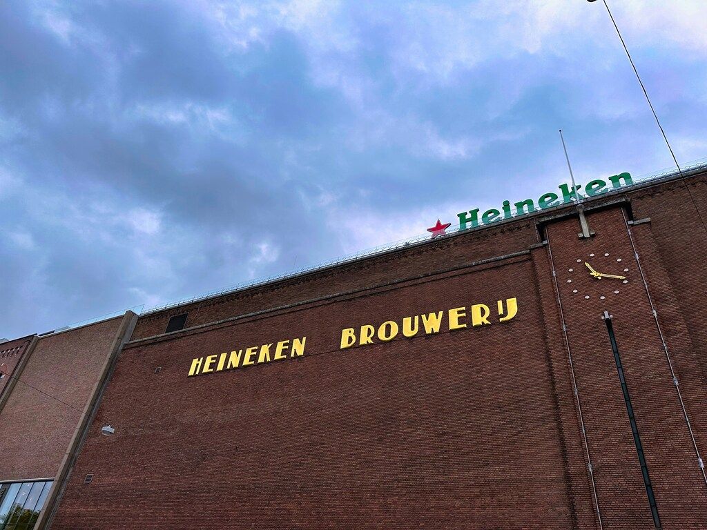 Exterior of the Heineken Brewery in Amsterdam with the iconic Heineken sign