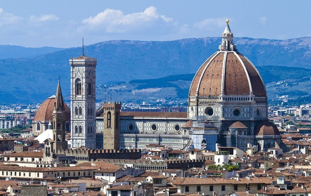 Panoramic view of Florence, Italy, featuring the iconic Cathedral of Santa Maria del Fiore with its majestic dome