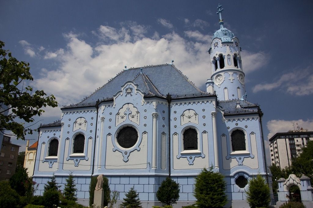 The Blue Church in Bratislava, a stunning example of Art Nouveau architecture with intricate blue details.