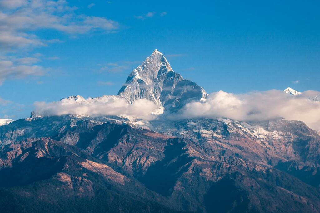 A breathtaking view of Mount Machapuchare, also known as the Fish Tail Mountain, towering above the Himalayan range.